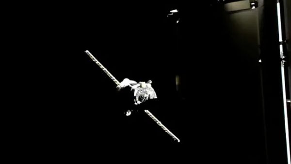RUSSIAN CARGO SHIP DOCKS AT SPACE STATION WITH SCIENCE, SPACESUIT AND SUPPLIES