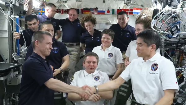INTERNATIONAL SPACE STATION UNDERGOES CREW HANDOVER, CHANGE OF COMMAND