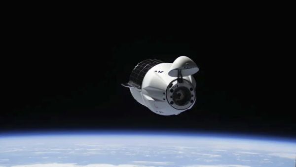 SPACEX DRAGON CARGO CAPSULE BOOSTS ISS HIGHER ABOVE EARTH IN KEY TEST