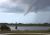 FUNNEL CLOUD HANGS OVER LAUNCH PAD