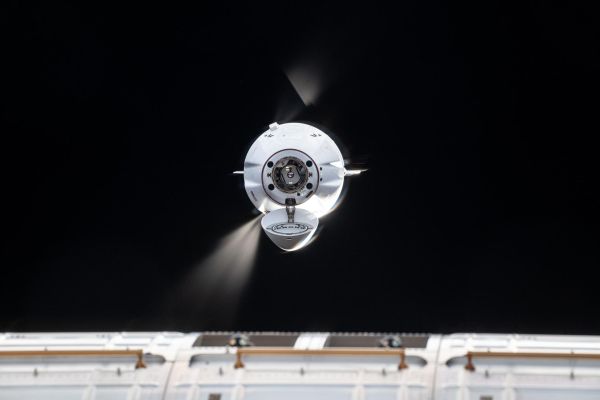 SPACEX DRAGON DOCKS TO STATION FILLED WITH NEW SCIENCE EXPERIMENTS