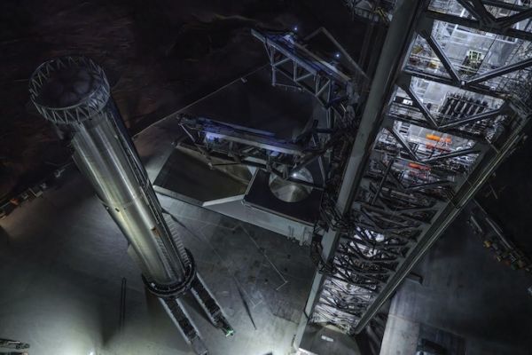 SPACEX’S SUPER HEAVY BOOSTER ARRIVES AT PAD AHEAD OF FIRST ORBITAL STARSHIP LAUNCH