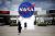 THREE FIRMS SHARE $1.1 BILLION OF NASA SPACE TAXI WORK