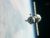 SOYUZ SPACECRAFT DOCKS AT SPACE STATION WITH NEW US-RUSSIAN CREW