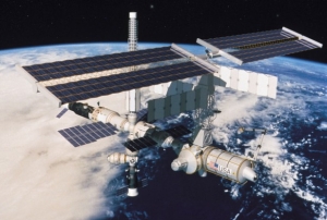 SCIENCE EXPERIMENT REQUIRES NEW ALTITUDE FOR SPACE STATION