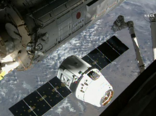 SPACEX'S DRAGON CARGO CAPSULE ARRIVES AT SPACE STATION