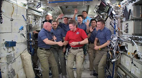 SCOTT KELLY TAKES OVER AS SPACE STATION COMMANDER
