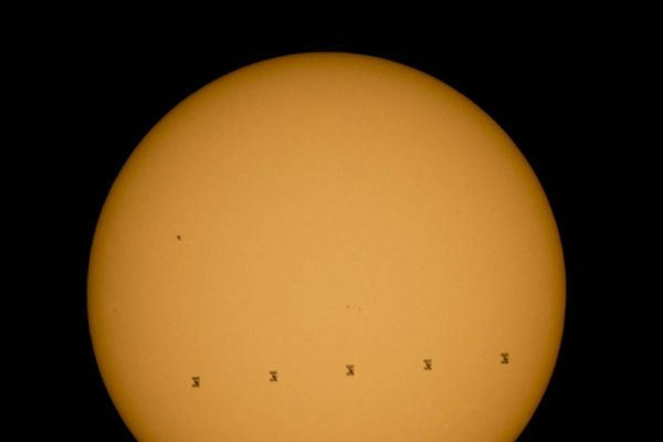 SPACE STATION CROSSES SUN'S FACE IN STUNNING PHOTO FROM EARTH