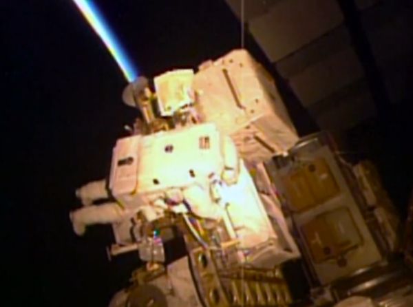 ASTRONAUT DUO PERFORMS THEIR FIRST SPACEWALK OUTSIDE SPACE STATION