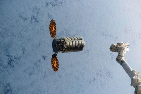 CHRISTMAS DELIVERY: SPACE STATION GETS 1ST US SHIPMENT IN MORE THAN HALF-YEAR, PRESENTS ABOARD