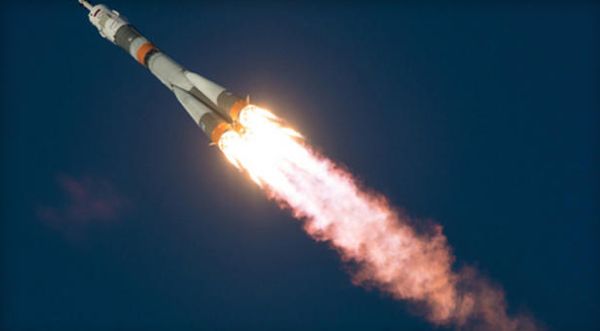 SOYUZ CREW OVERCOMES GLITCH TO DOCK WITH SPACE STATION