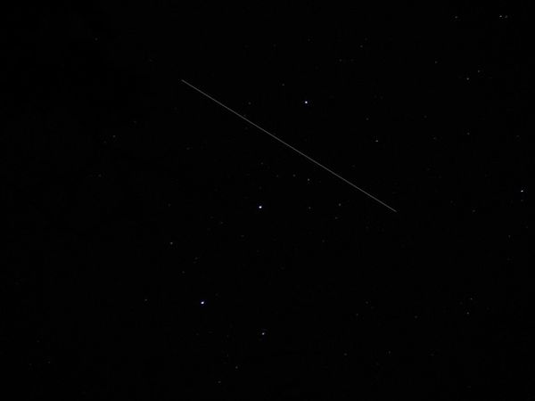 STARGAZER SPIES SPACE STATION STREAKING THROUGH ORION'S BELT