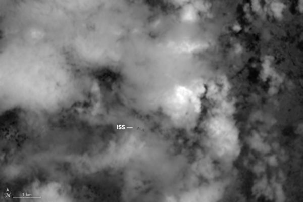 SATELLITE SPIES INTERNATIONAL SPACE STATION ORBITING EARTH