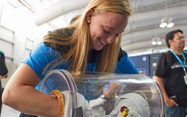 WHAT IT'S LIKE TO WORK IN SPACE, USING BULKY EVA GLOVES