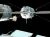 UNMANNED SHIP DOCKS AT SPACE STATION