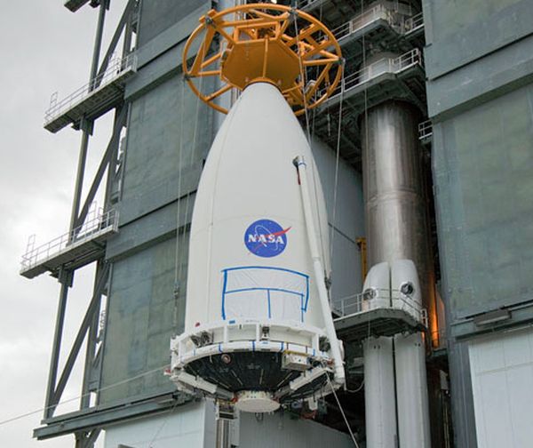 ADVANCED WEATHER BIRD MOUNTED ATOP ATLAS 5 ROCKET FOR LAUNCH INTO SPACE 