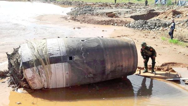 LARGE METAL CYLINDER CRASHES TO EARTH IN MYANMAR 