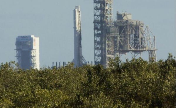 FIRST SPACEX FALCON 9 ERECTED AT HISTORIC LAUNCH PAD 39A FOR FEB. 18 BLASTOFF