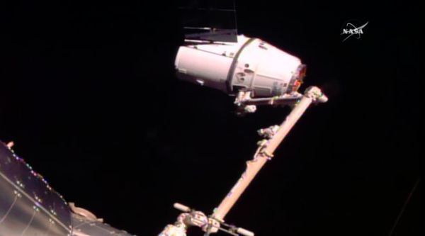 SPACEX DRAGON DELIVERS NASA CARGO TO SPACE STATION AFTER 24-HOUR DELAY