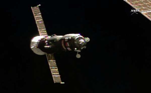 RUSSIAN FREIGHTER LINKS UP WITH INTERNATIONAL SPACE STATION