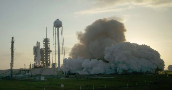 SPACEX TEST FIRES ROCKET, AIMS FOR MARCH 14 SATELLITE LAUNCH
