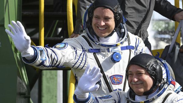 SOYUZ SPACE CAPSULE WITH AMERICAN, RUSSIAN ONBOARD ARRIVES AT INTERNATIONAL SPACE STATION