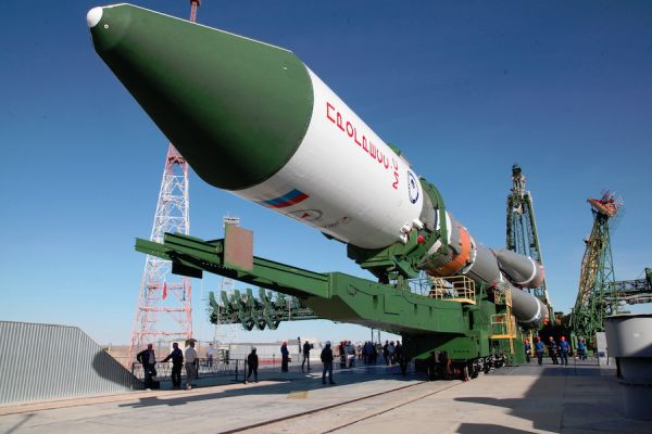 SOYUZ BOOSTER ROLLS OUT FOR LAUNCH WITH SPACE STATION CARGO FREIGHTER