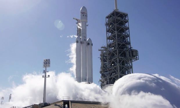 SPACEX FIRES UP ITS BIGGEST ROCKET, PAVING WAY FOR A TEST FLIGHT