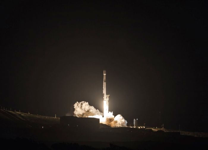 RECYCLED SPACEX ROCKET BOOSTS PAZ RADAR SATELLITE, FIRST STARLINK TESTBEDS INTO ORBIT