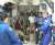 SHUTTLE ARRIVES AT STATION, DELIVERS NEW FLIGHT ENGINEER