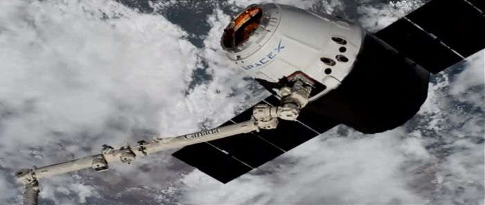 SPACEX CARGO CAPSULE ARRIVES AT SPACE STATION WITH TONS OF SUPPLIES