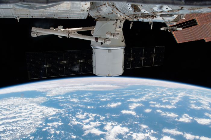 DRAGON CARGO CRAFT’S RETURN TO EARTH DELAYED TO SATURDAY