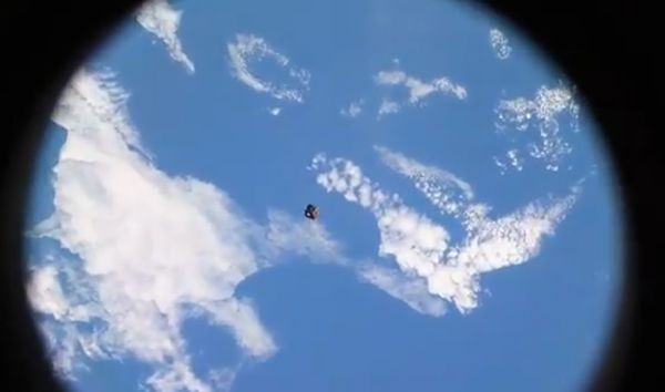 WATCH AS A BORG-LIKE SATELLITE ZIPS BY THE ISS