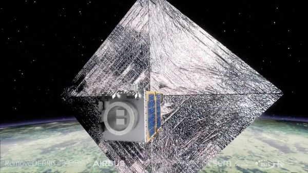 1ST SATELLITE BUILT TO HARPOON SPACE JUNK FOR DISPOSAL BEGINS TEST FLIGHT