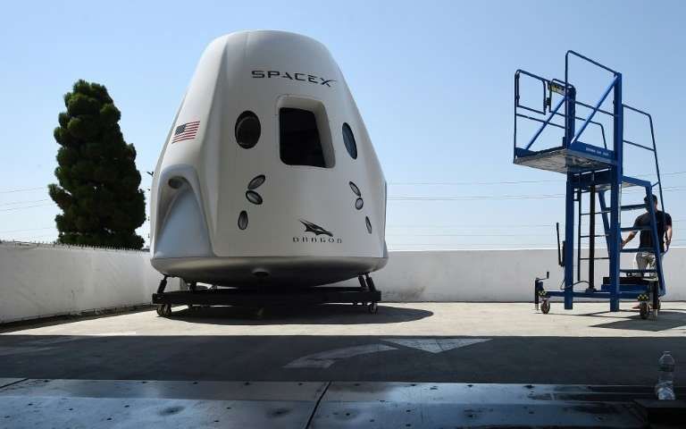 SPACEX VOWS MANNED FLIGHT TO SPACE STATION IS ON TRACK