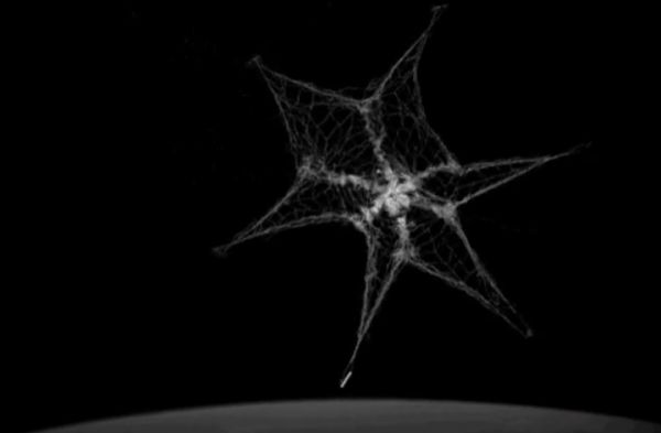 SATELLITE USES GIANT NET TO PRACTICE CAPTURING SPACE JUNK