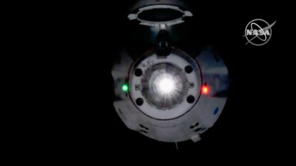 SPACEX CREW CAPSULE WELCOMED ABOARD SPACE STATION