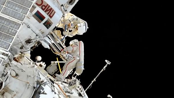 COSMONAUTS COMPLETE TASKS OUTSIDE SPACE STATION, HONOR SPACEWALK PIONEER 