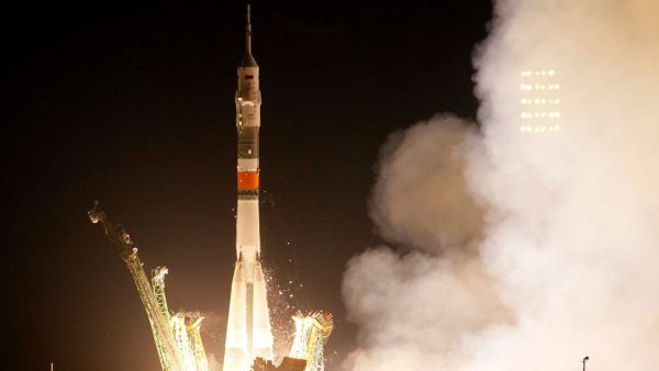 ON APOLLO 11 ANNIVERSARY, US ASTRONAUT BLASTS OFF TO THE SPACE STATION IN A RUSSIAN SOYUZ SPACECRAFT