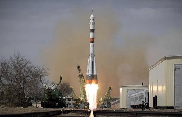 UPGRADED SOYUZ ROCKET WITH CREW OF THREE LAUNCHED TO SPACE STATION