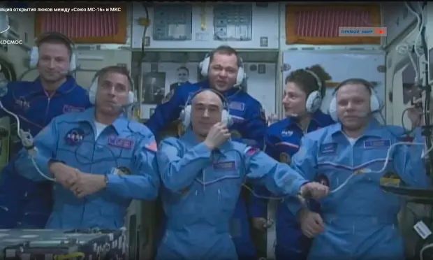 ASTRONAUTS PREPARE TO RETURN FROM ISS TO WORLD TRANSFORMED BY CORONAVIRUS
