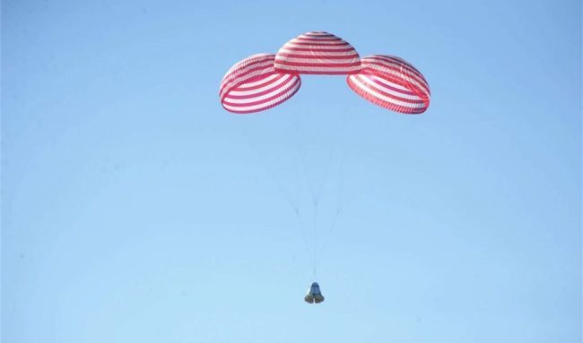 CHINA'S NEW SPACE CAPSULE LANDS SAFELY TO END 1ST UNCREWED TEST FLIGHT