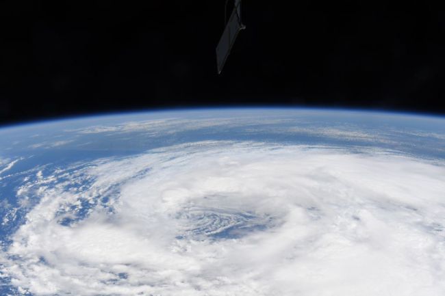 TROPICAL STORM CRISTOBAL CAPTURED IN ASTRONAUT, SATELLITE IMAGERY