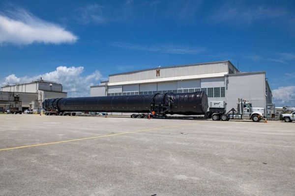 FALCON 9 BOOSTER ARRIVES FOR NEXT ASTRONAUT LAUNCH FROM SPACE COAST