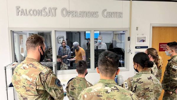 CADETS FROM THE U.S. AIR FORCE ACADEMY BUILD SATELLITE OPERATING IN SPACE