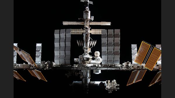 STATION BOOSTS ORBIT FOR MARCH CREW SWAP