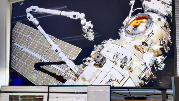 ROBOTIC SPACE ARM SUCCESSFULLY COMPLETES TEST BY MOVING A SUITCASE-SIZED OBJECT AROUND THE INTERNATIONAL SPACE STATION