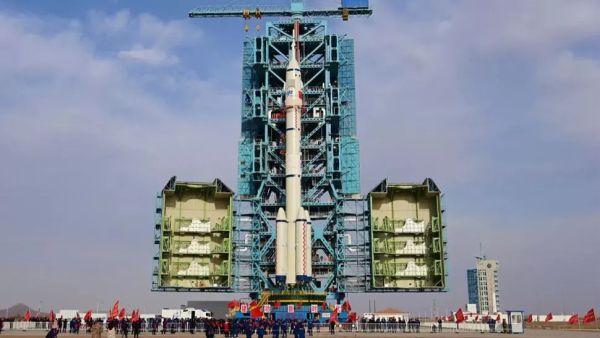 China rolls out rocket to launch new crew to newly-completed space station
