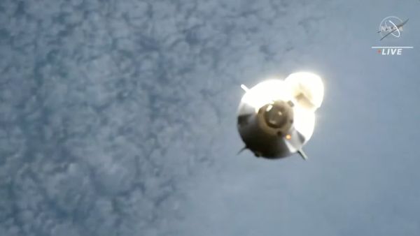 AFTER SLIGHT DELAY, SPACEX ASTRONAUT CAPSULE DOCKS AT SPACE STATION