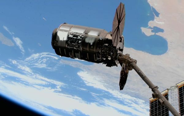 CYGNUS CARGO SHIP BERTHED AT SPACE STATION